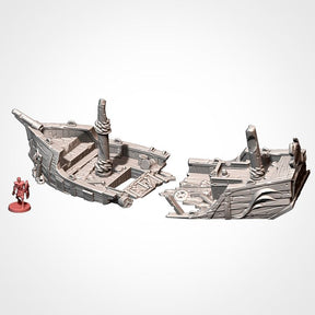 Wrecked hull sections, shown beside a 32mm miniature for scale