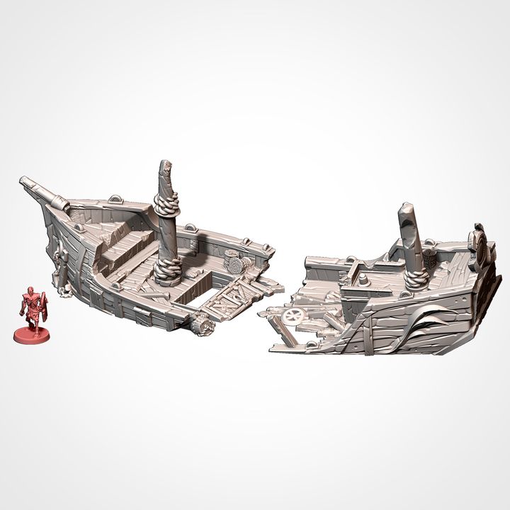 Wrecked hull sections, shown beside a 32mm miniature for scale